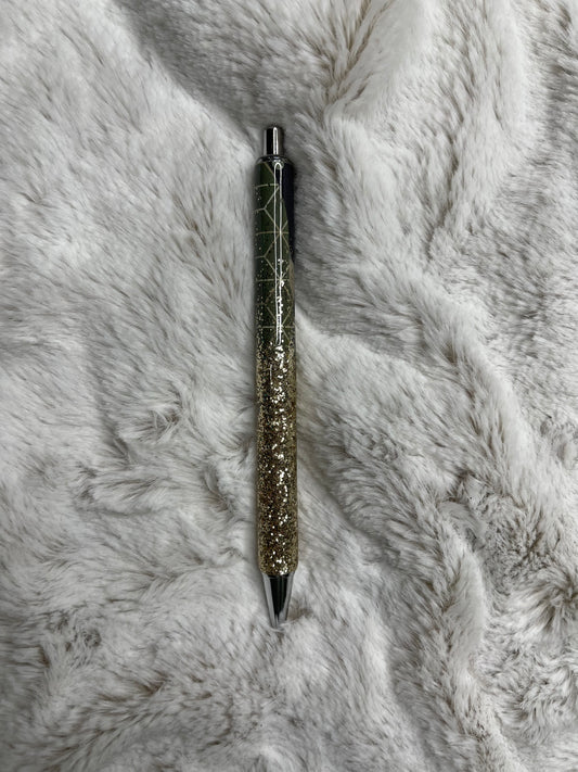 Camouflage and Gold Pen